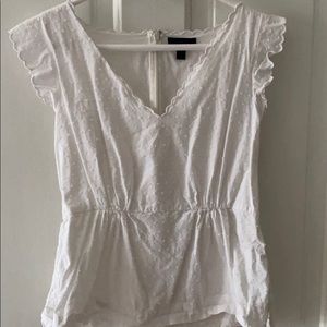 White peplum top